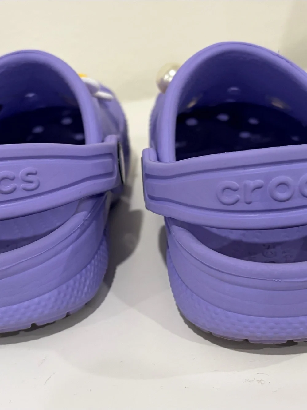 Girls size 9 toddler. Purple CROCS  Great Condition! Charms included